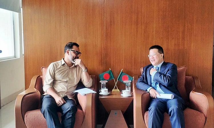 State Minister for Youth and Sports Md Aminul Haque welcoming the Chinese Ambassador Yao Wen at his ministry office.