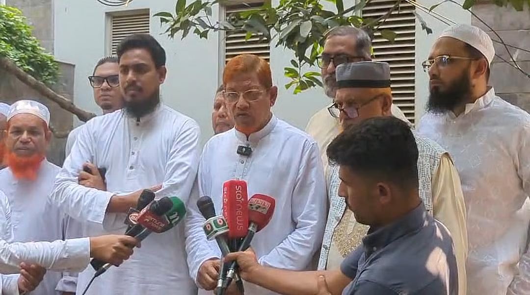 Bangladesh Jamaat-e-Islami's assistant secretary general Hamidur Rahman Azad briefs journalists after a meeting of 11-party alliance on 2 April