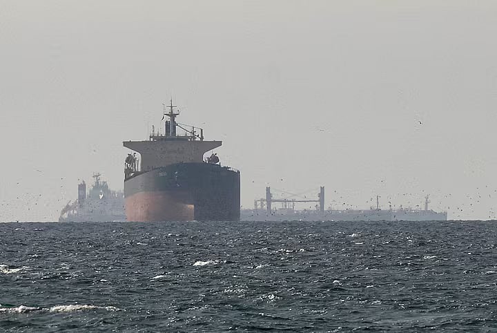 Cargo ships in the Gulf, near the Strait of Hormuz, as seen from northern Ras al-Khaimah, near the border with Oman’s Musandam governance, amid the US-Israeli conflict with Iran, in United Arab Emirates, 11 March, 2026.
