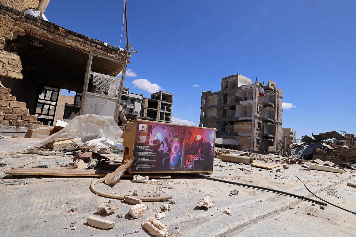 Residential buildings that were damaged by recent strikes are pictured at Vahdat town in Karaj, southwest of Tehran on 3 April 2026
