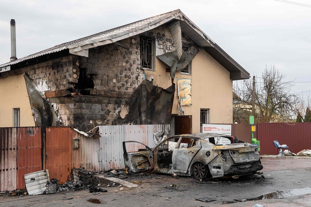 This photograph taken on 3 April, 2026 shows a destroyed car next to a damaged veterinary clinic building following an air attack in Chabany, Kyiv region, amid the Russian invasion of Ukraine.