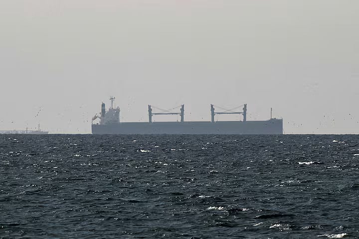 A cargo ship in the Gulf, near the Strait of Hormuz, as seen from northern Ras al-Khaimah, near the border with Oman’s Musandam governance, amid the US-Israeli conflict with Iran, in United Arab Emirates, 11 March, 2026.