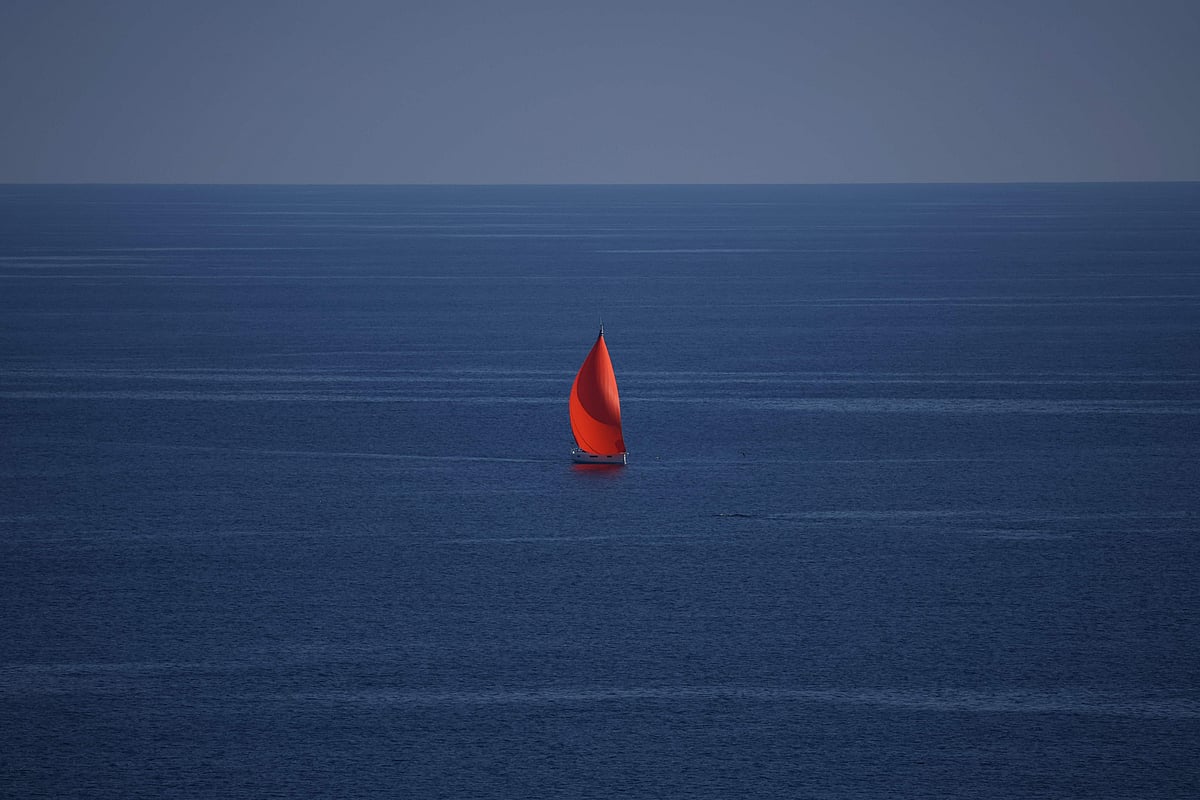 This photograph shows a sailboat on the Mediterranean ocean from Roquebrune-Cap-Martin, south-eastern France on 9 April, 2026.