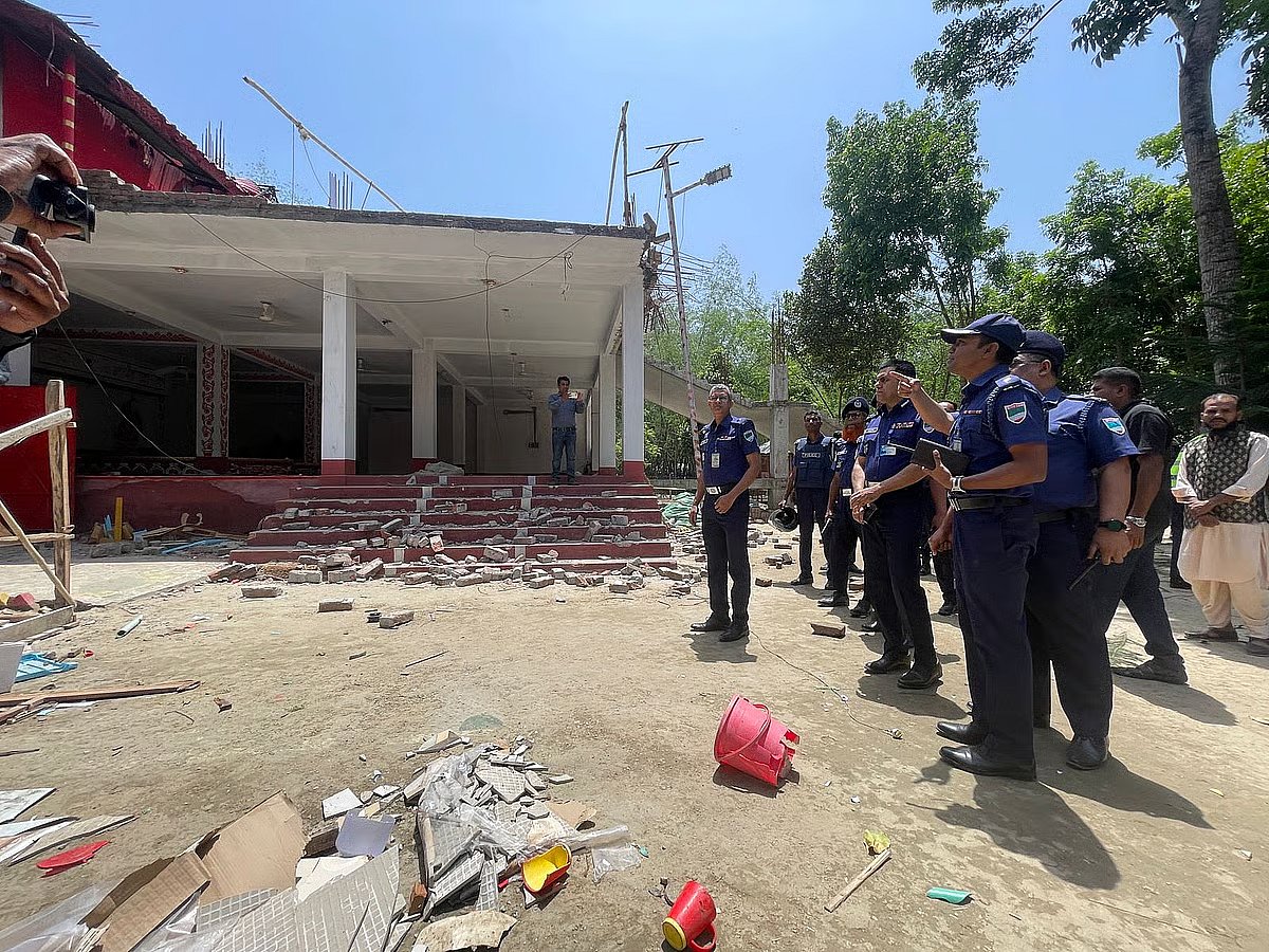 More than fifty police personnel were deployed at the shrine. The photo was taken in Philipnagar village of Daulatpur, Kushtia on 12 April 2026.
