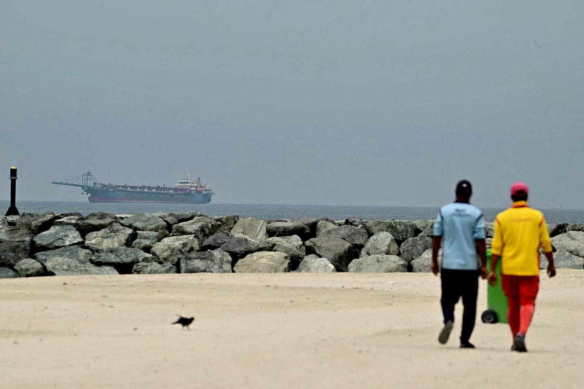 A ship is seen in the Persian Gulf off the coast of Sharjah the day after the failure of US-Iran peace talks on 13 April 2026