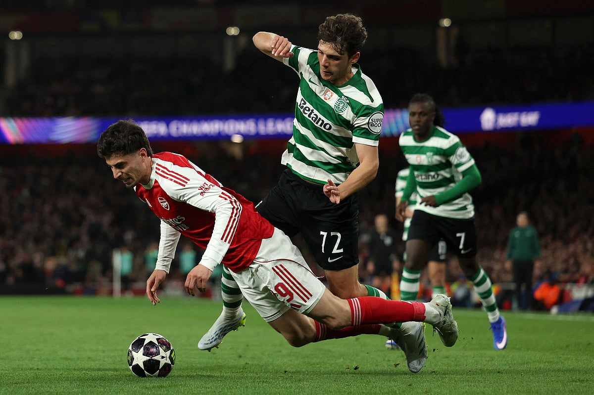 Arsenal's German midfielder #29 Kai Havertz falls to the floor during the UEFA Champions League quarter-final, second-leg football match between Arsenal and Sporting Lisbon at the Emirates Stadium in north London on April 15, 2026. (Photo by Adrian Dennis / AFP)