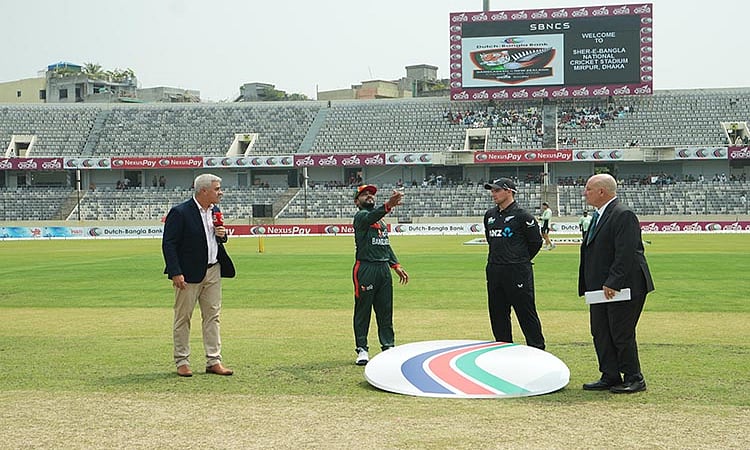 Bangladesh skipper Mehidy Hasan Miraz flips the coin during the toss in the opening match of the three-match ODI series against Bangladesh at the Sher-e-Bangla National Cricket Stadium on 17 April 2026.