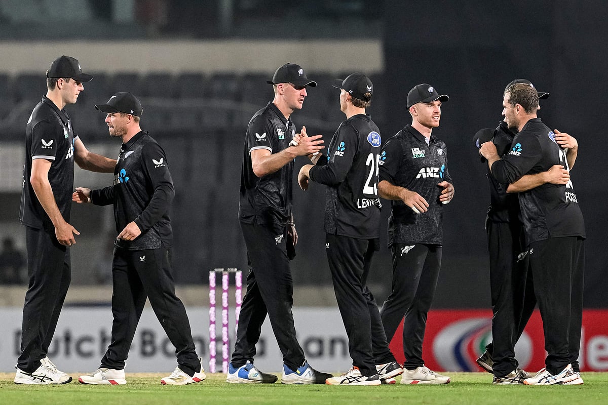 New Zealand's players celebrate their team's win at the end of the first one-day international (ODI) cricket match between Bangladesh and New Zealand at Sher-e-Bangla National Stadium in Mirpur on 17 April 2026.