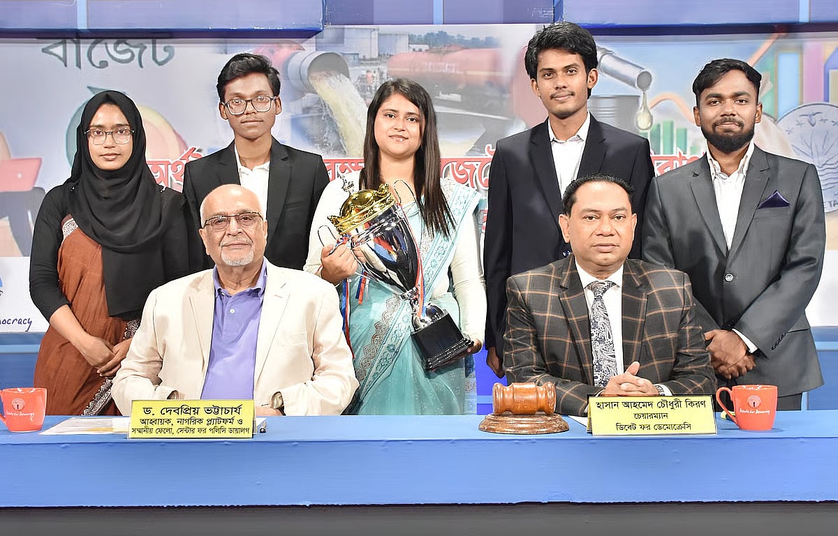 CPD's Distinguished Fellow Debapriya Bhattacharya and The debate competition Hasan Ahmed Chowdhury, Chairman of Debate for Democracy pose with debaters following a competition on 18 April
