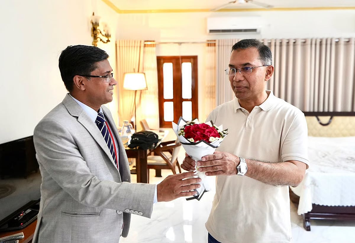 Deputy commissioner of Bogura Md Toufiqur Rahman welcomed Prime Minister Tarique Rahman with flowers at the Bogura Circuit House.