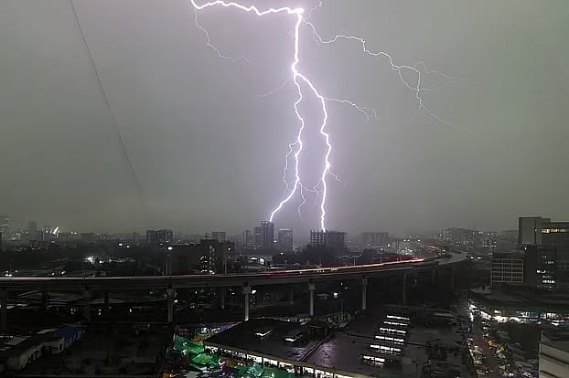 After several days of continuous heat, rain drenched Dhaka today. Flashes of lightning were also seen in the darkened sky before the downpour. The photo was taken around 5:00 pm on Sunday in the Tejgaon area of the capital.