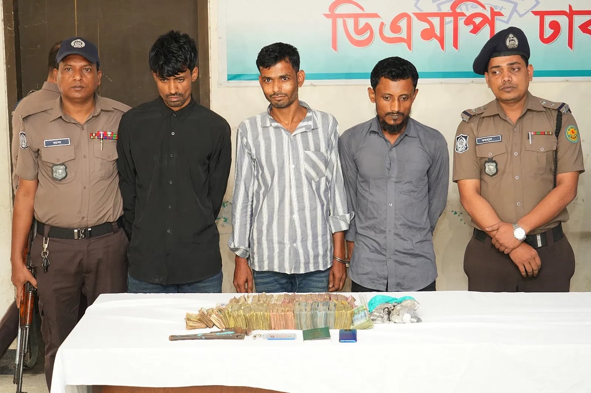 Police arrested three people in connection with a robbery at a church in Baridhara, Dhaka and recovered the looted money and other items from them. Police present them at a press conference at Bhatara police station in Dhaka on 1 May 2026. 