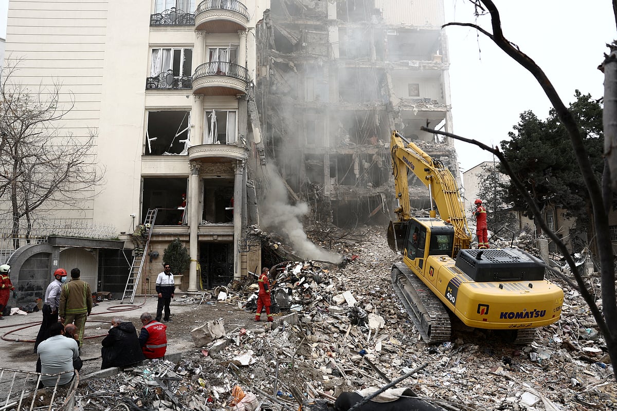 A view of a residential building damaged by a strike, amid the U.S.-Israeli conflict with Iran, in Tehran, Iran, 23 March 2026.