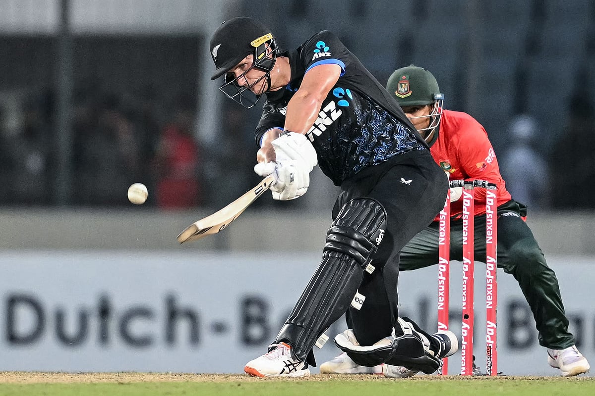New Zealand's Bevon Jacobs (L) plays a shot during the third T20 cricket match between Bangladesh and New Zealand at the Sher-e-Bangla National Stadium in Mirpur on May 2, 2026. (Photo by MUNIR UZ ZAMAN / AFP)