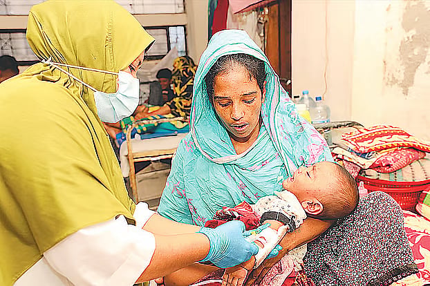A child with measles undergoing treatment at a hospital.