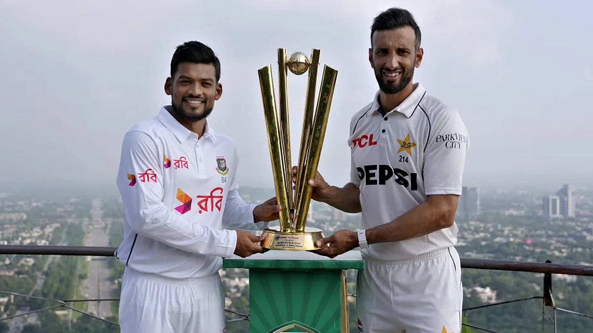 Bangladesh captain Najmul Hossain Shanto and Pakistan captain Shan Masood with the trophy.