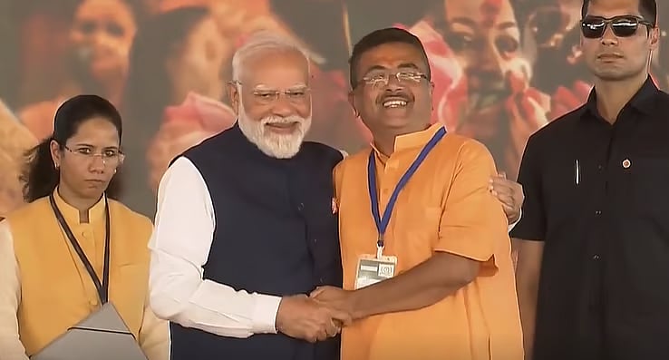 After the oath-taking ceremony, Prime Minister Narendra Modi greets West Bengal Chief Minister Suvendu Adhikari at the Brigade Parade Ground in Kolkata on 9 May 2026.