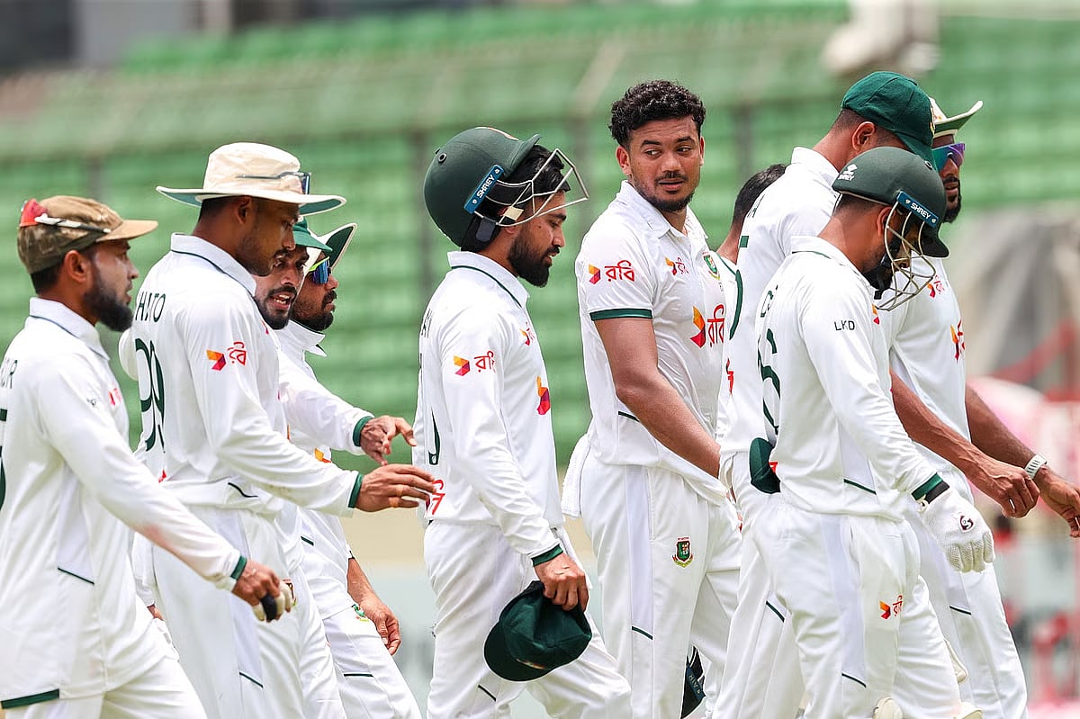 Bangladesh team return to pavilion during the lunch break on the fifth day of the first Test against Pakistan at Sher-e-Bangla National Cricket Stadium, Mirpur, Dhaka on 12 May 2026