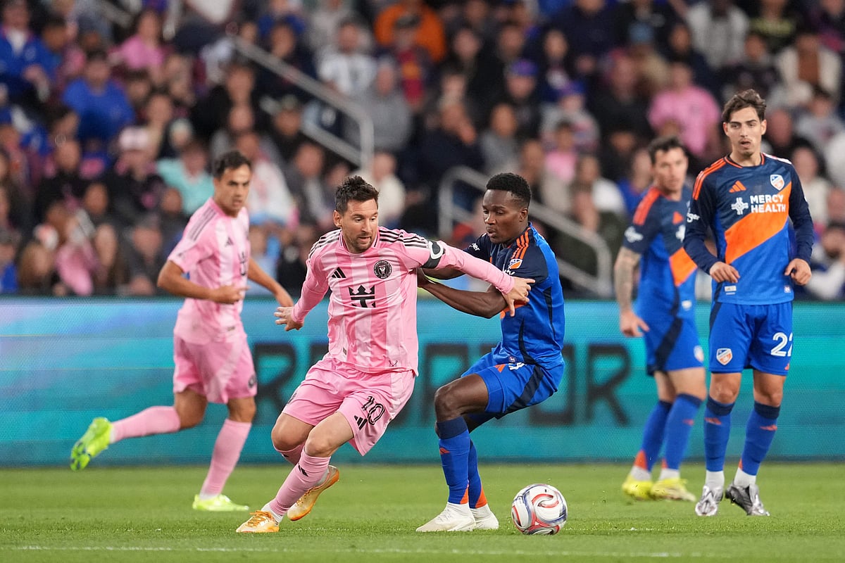 Lionel Messi #10 of Inter Miami CF is challenged by Samuel Gidi #11 of FC Cincinnati during the MLS match between FC Cincinnati and Inter Miami CF at TQL Stadium on 13 May, 2026 in Cincinnati, Ohio.