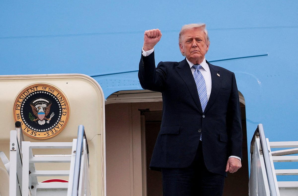 US President Donald Trump gestures as he departs Beijing Capital International Airport aboard Air Force One, in Beijing, China, 15 May, 2026.