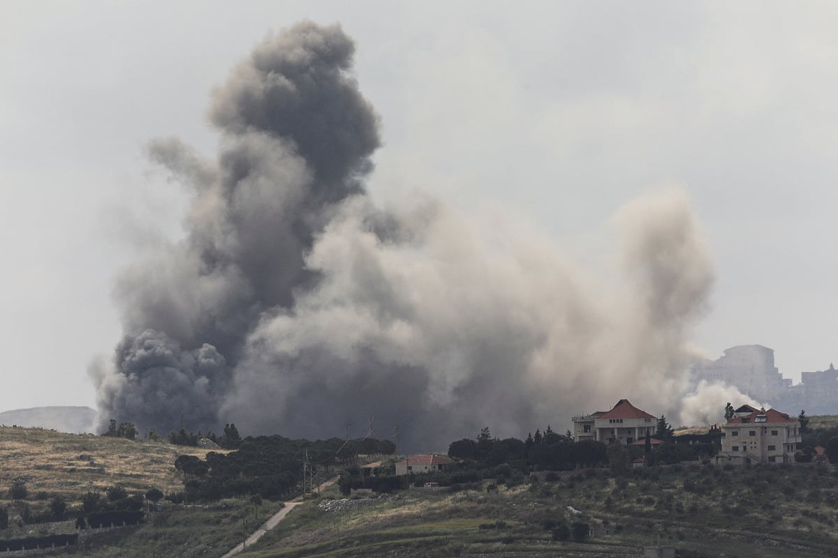 Smoke billows from southern Lebanon following an Israeli strike, as seen from Marjeyoun, Lebanon, 15 May, 2026.