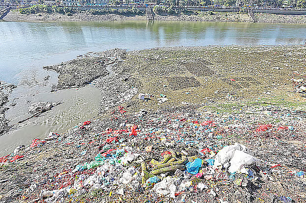 Plastic makes up most of the piles of waste accumulated along the banks of the Surma River in Sylhet.