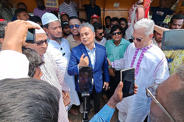 In protest of the absence of a picture of Prime Minister Tarique Rahman on the event's banner, local BNP leaders and activists blocked the Bridge Minister. The incident took place at Boga Ferry Terminal in Bauphal Upazila, Patuakhali.