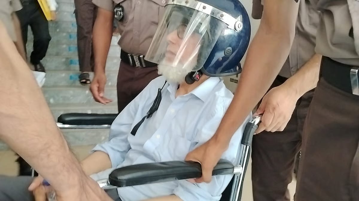 Former Chief Justice Khairul Haque is being taken to the courtroom on 23 May 2026.