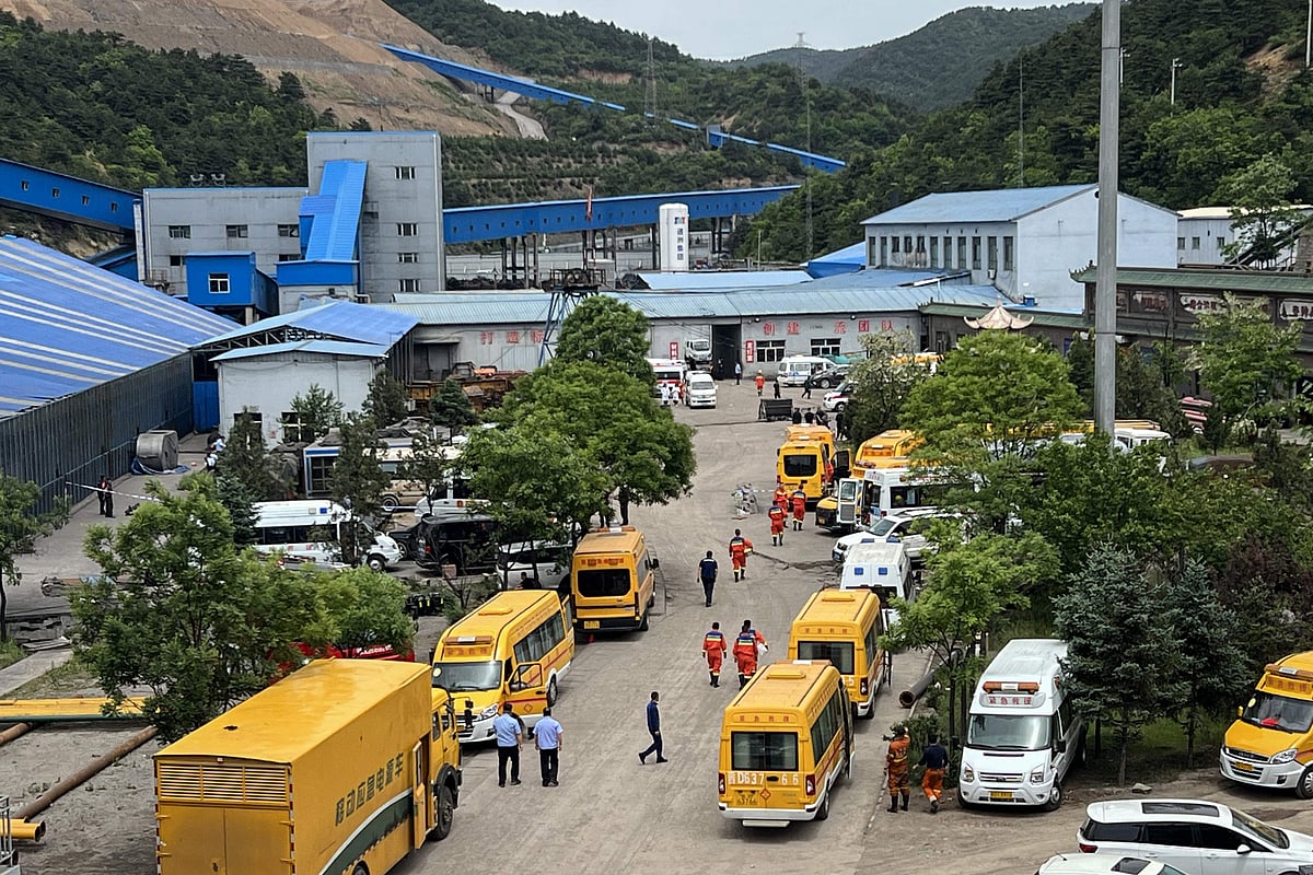 A general view of rescue team members and emergency vehicles arriving at the Liushenyu coal mine after a gas explosion in Changzhi, in northern China's Shanxi province on 23 May, 2026. A gas explosion at a coal mine in northern China has killed at least 82 people, state media reported, in one of the country's biggest industrial disasters of recent years.