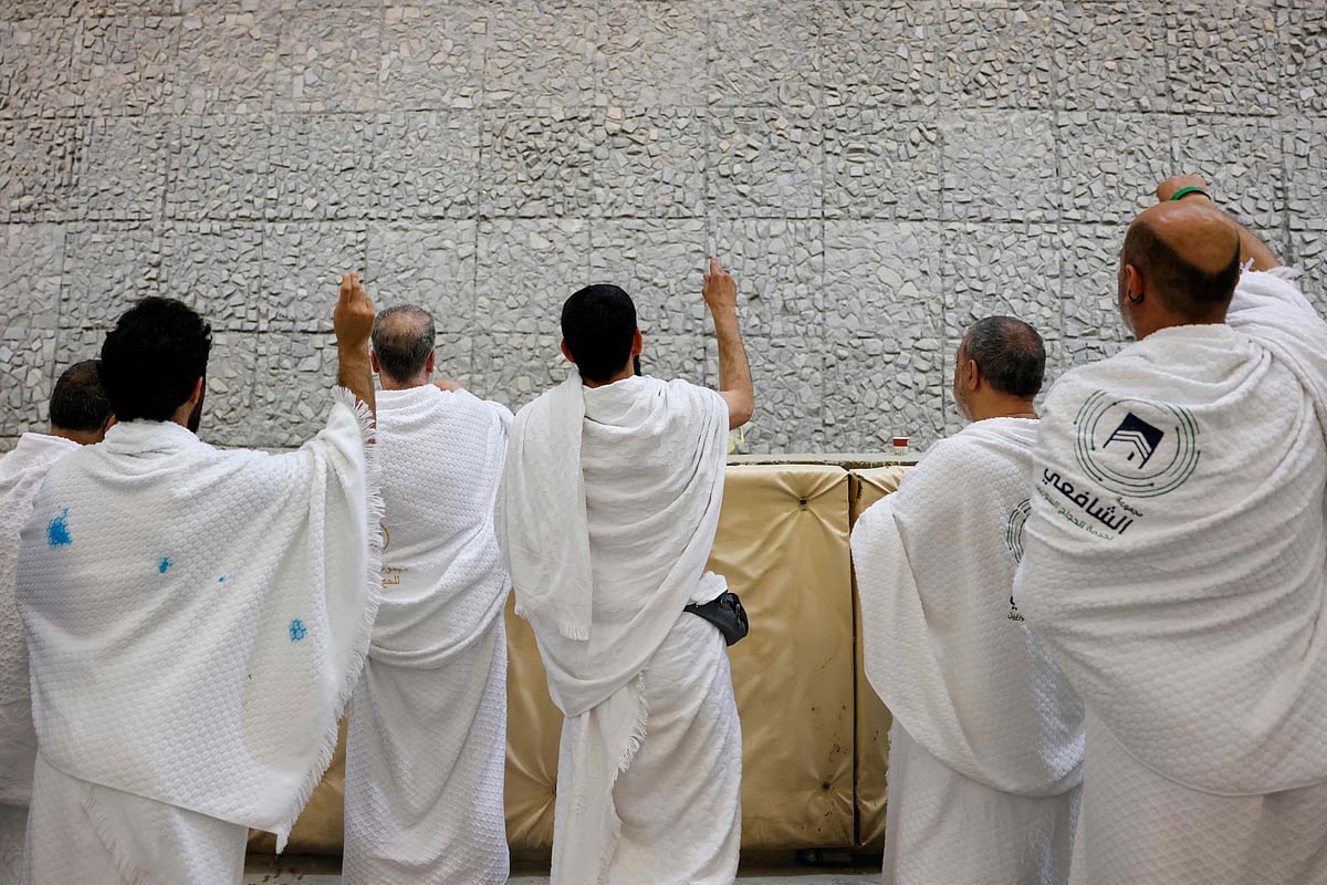 Muslim pilgrims perform the symbolic 'stoning of the devil' ritual as part of the Hajj pilgrimage in Mina on 27 May 2026, commemorating the tradition that the Prophet Abraham cast stones at the devil at three sites where Satan is said to have tried to dissuade him from obeying God’s command to sacrifice his son.