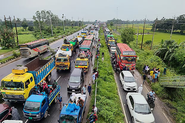 Severe traffic congestion before Jamuna Bridge on the Dhaka–Tangail Highway. Vehicles are moving intermittently. The photo was taken today, Wednesday, around 11 am in the Bikramhati area of Tangail Sadar upazila.