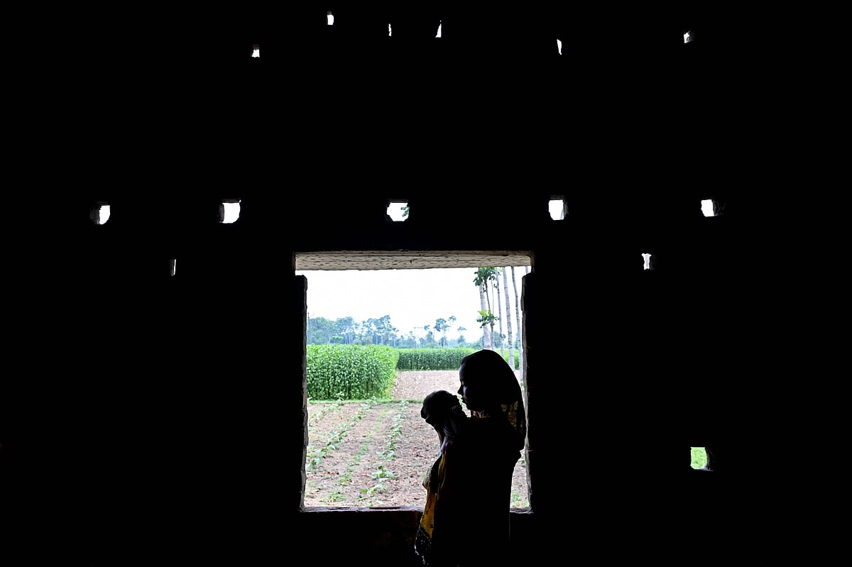 TOPSHOT-INDIA-BANGLADESH-POLITICS-BORDER-MIGRANTS