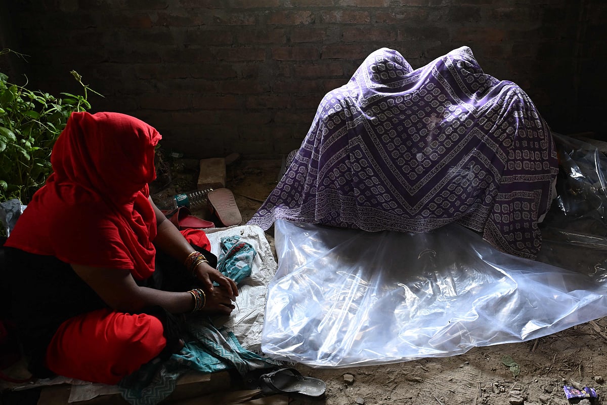 Bangladeshi migrants who had allegedly illegally crossed border, arrive for verification near the Indian Border Security Force (BSF) camp at Hakimpur on the outskirts of Kolkata on 28 May 2026.