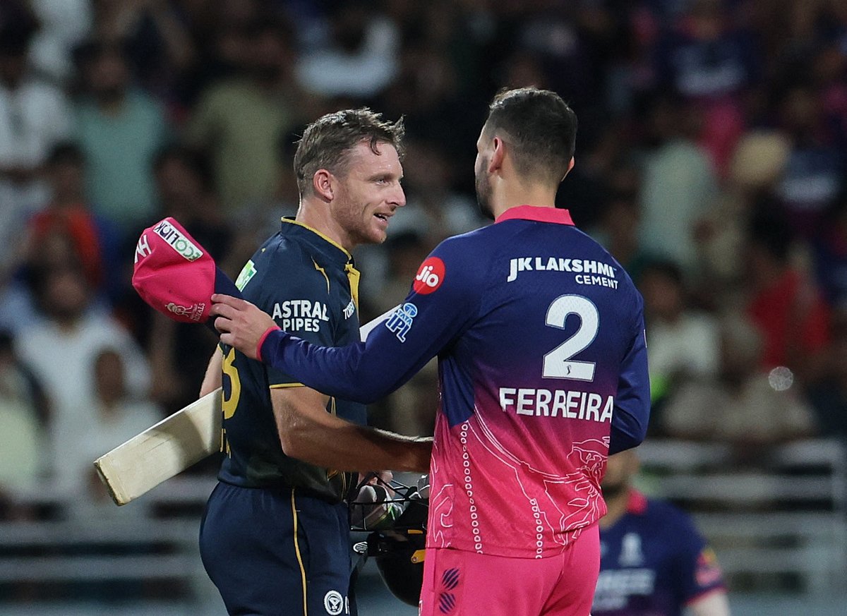 Gujarat Titans' Jos Buttler shakes hands with Rajasthan Royals' Donovan Ferreira after the match during the Indian Premier League (IPL) Qualifier 2 cricket match between Gujarat Titans and Rajasthan Royals at the Maharaja Yadavindra Singh International Cricket Stadium in New Chandigarh, India, on 29 May 2026.