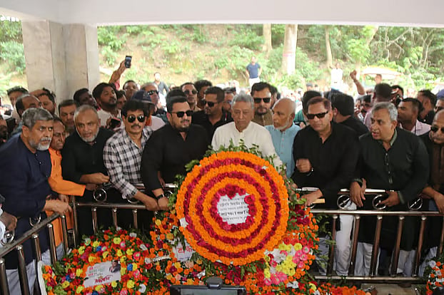 Finance Minister Amir Khasru Mahmud Chowdhury lays wreaths at the first grave site of martyred President Ziaur Rahman in Rangunia, Chattogram, on the occasion of the 45th anniversary of his martyrdom. Saturday afternoon