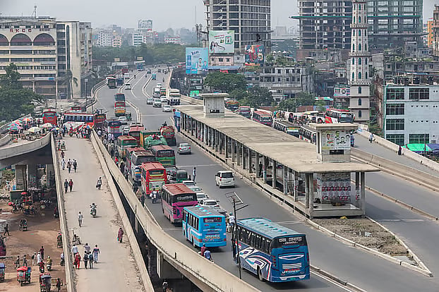 The project was designed so only special buses would operate along a dedicated lane in the middle of the road, avoiding traffic congestion and delays at traffic signals. The four-year project has now been ongoing for 14 years. The buses have yet to begin service, and public suffering has not eased. This is the current state of the BRT project running from the Airport area to Gazipur. Photo taken at Abdullahpur intersection in Tongi on 18 May