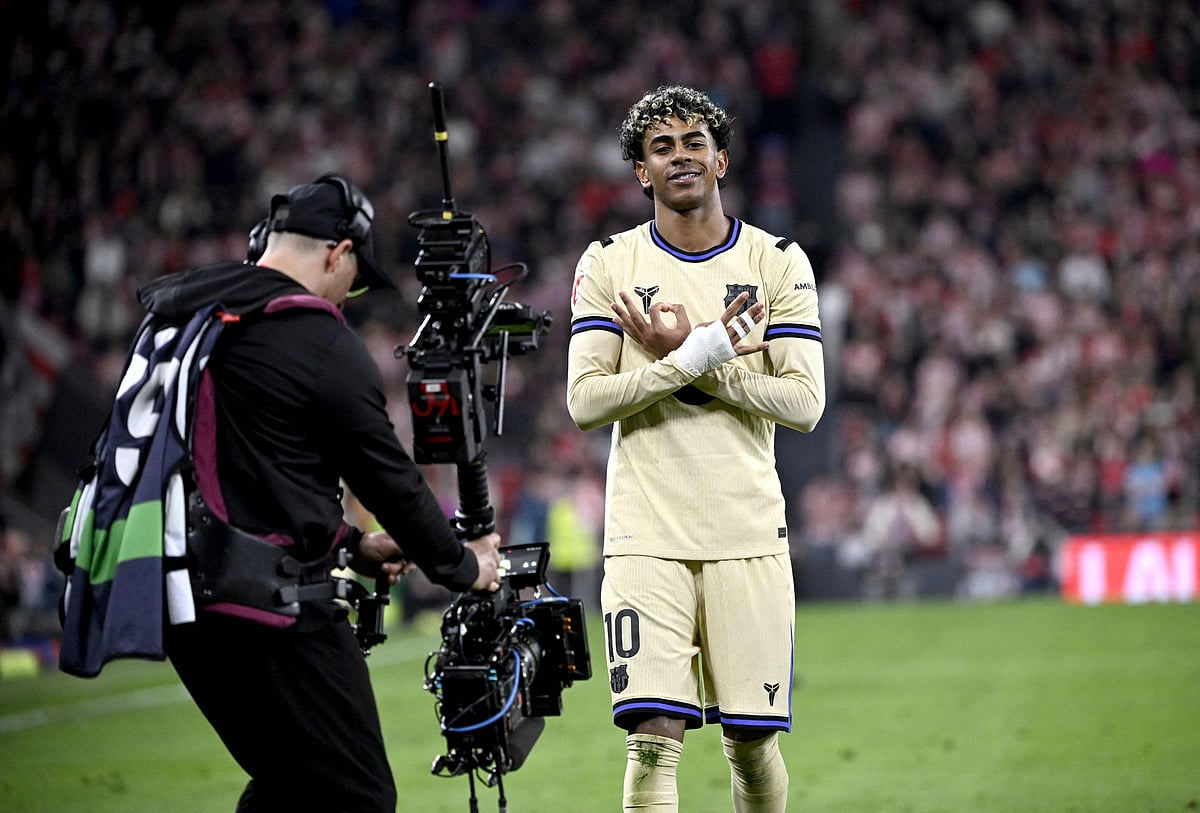 Barcelona's Spanish forward #10 Lamine Yamal celebrates scoring his team's first goal during the Spanish league football match between Athletic Club Bilbao and FC Barcelona at San Mames Stadium in Bilbao on 7 March, 2026.