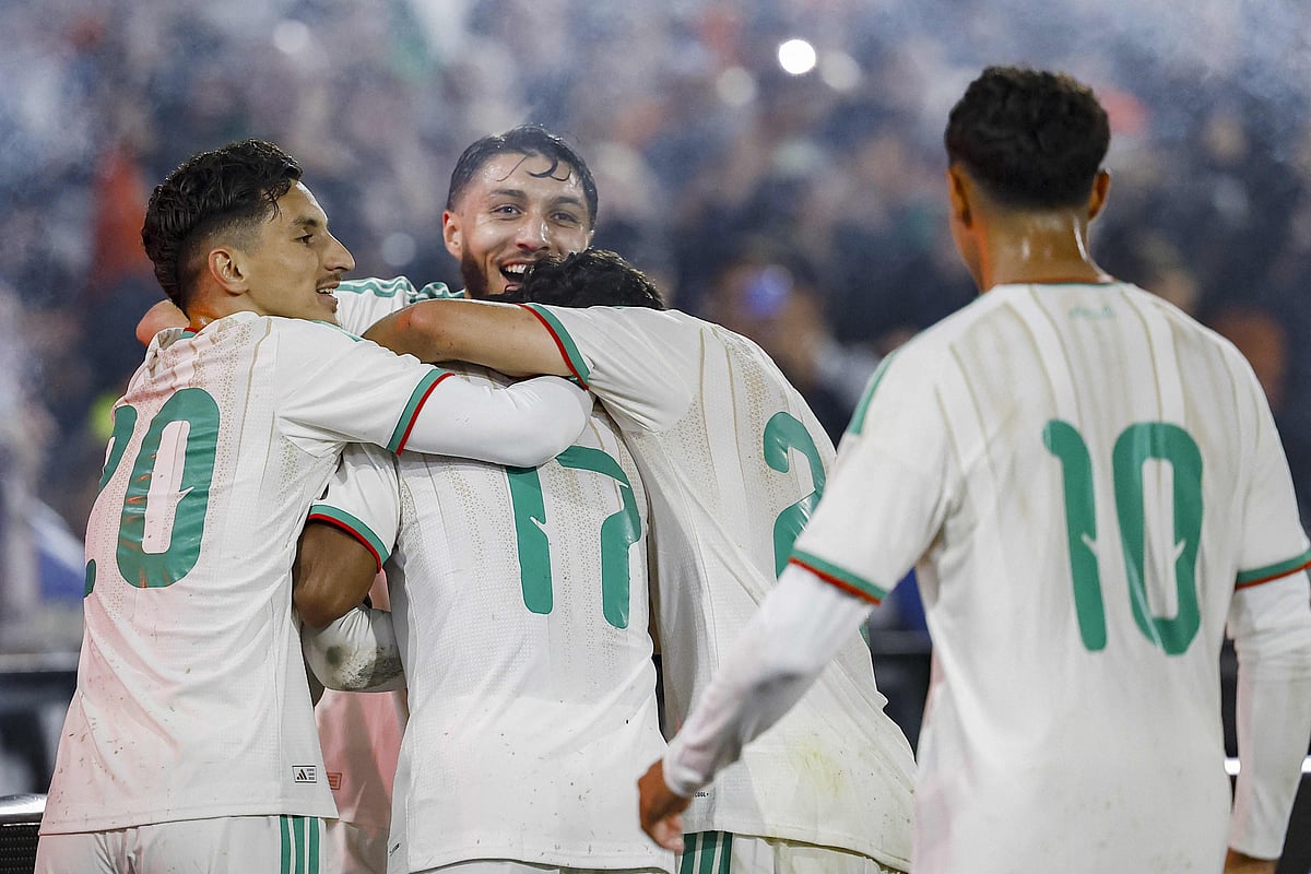 Algeria's players celebrate the opening goal during the international friendly football match between the Netherlands and Algeria ahead of the 2026 FIFA World Cup football tournament at the De Kuip stadium in Rotterdam on 3 June, 2026.