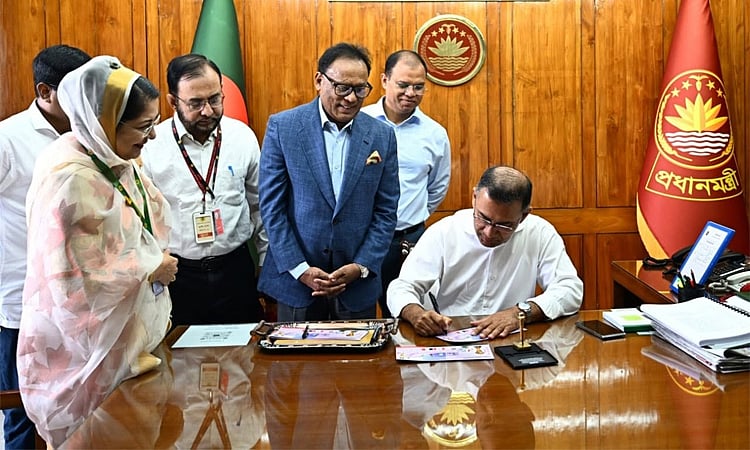 Prime Minister Tarique Rahman unveils a commemorative postage stamp worth Tk 10 on the occasion of the World Cup Football-2026 at his office on 11 June 2026