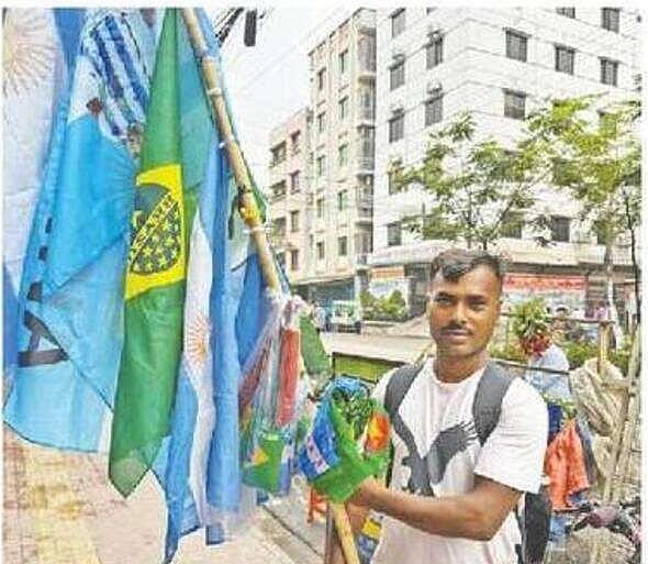 Kazi Sumon sells World Cup jerseys and flags in Dhaka