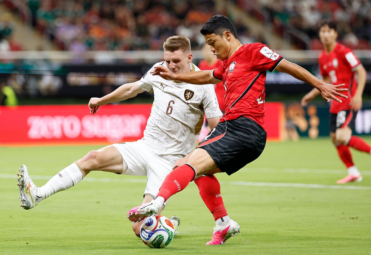 Czech Republic's defender #06 Stepan Chaloupek and South Korea's midfielder #11 Hwang Hee-chan fight for the ball during the 2026 World Cup Group A football match between South Korea and the Czech Republic at the Guadalajara Stadium in Zapopan on 11 June, 2026.