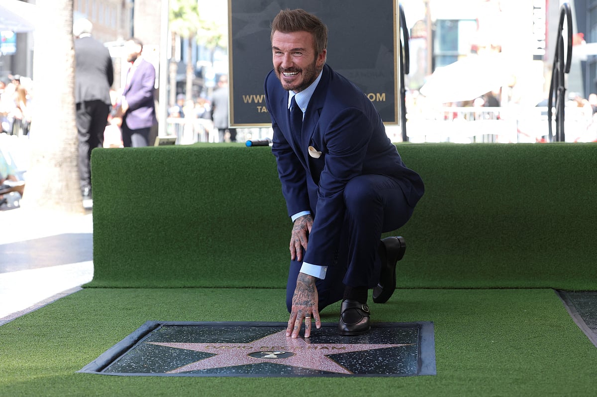 David Beckham poses on his star after it was unveiled on the Hollywood Walk of Fame in Los Angeles, California, U.S., 12 June2026.