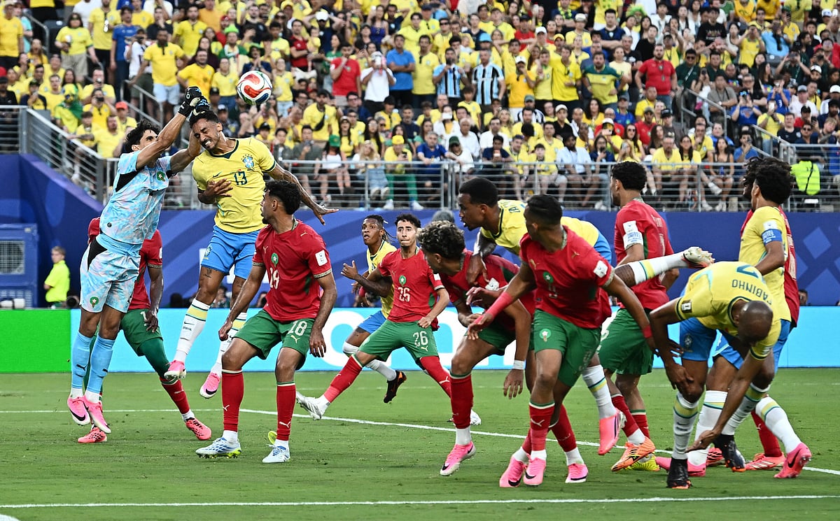 Morocco's Yassine Bounou makes a save under pressure from Brazil's Danilo at  New York/New Jersey Stadium, East Rutherford, New Jersey, US, on 13 June, 2026