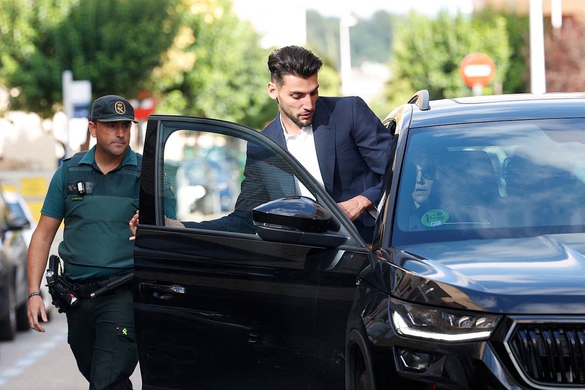 Valencia football player Rafa Mir leaves a Valencia local court after a judge released him with precautionary measures for an alleged crime of sexual assault, in Liria, Spain, 4 September 2024.