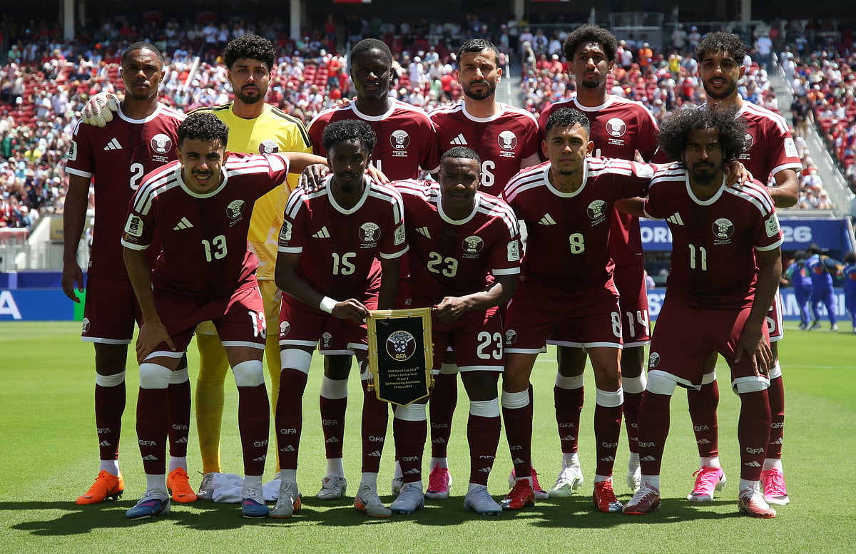 Football - FIFA World Cup 2026 - Group B - Qatar v Switzerland - San Francisco Bay Area Stadium, Santa Clara, California, U.S. - June 13, 2026
Qatar players pose for a team group photo before the match