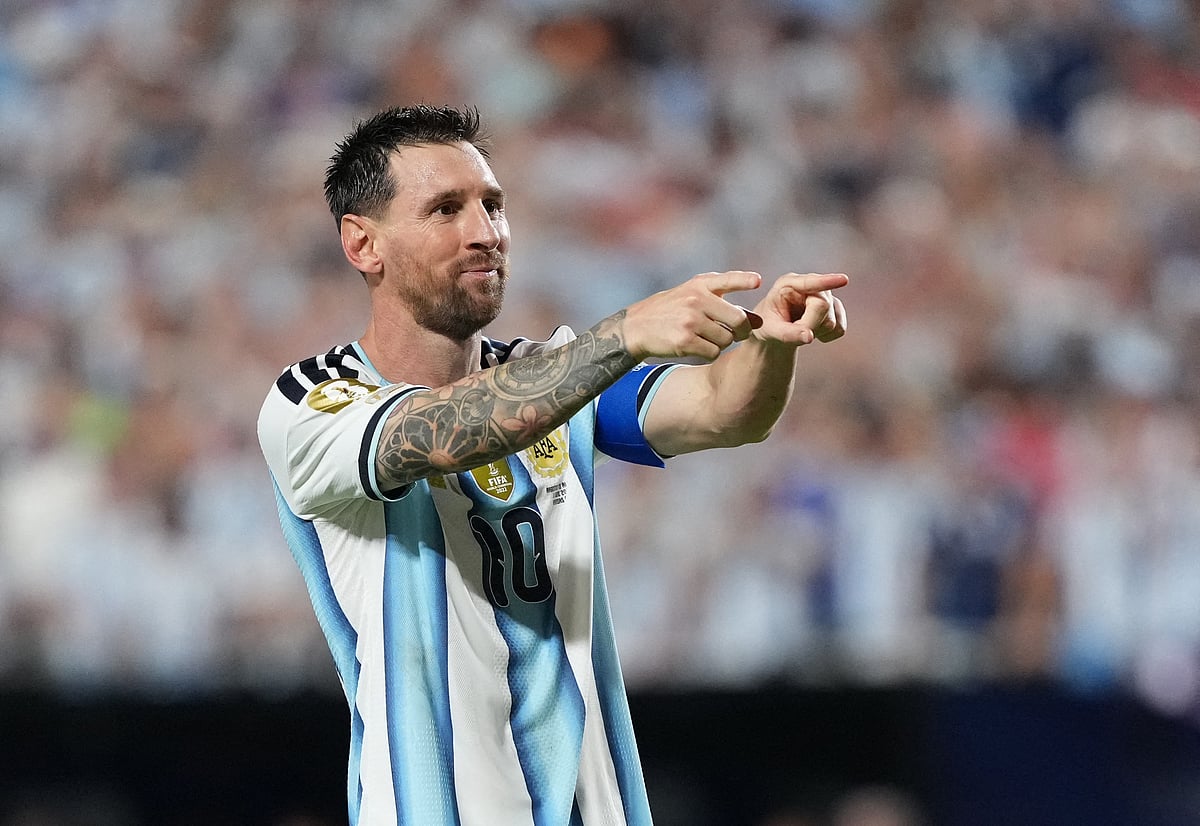 Argentina's Lionel Messi celebrates scoring their third goal to complete a hat-trick 
