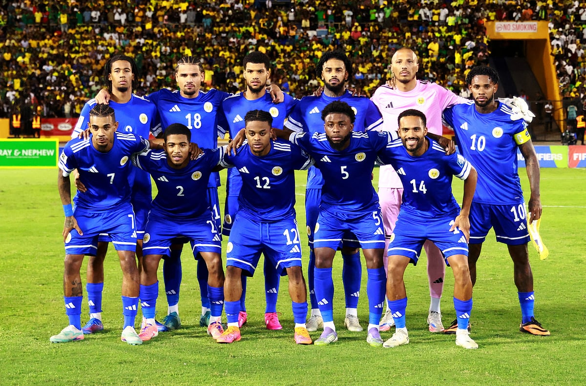 Curacao players pose for a team group photo before the match