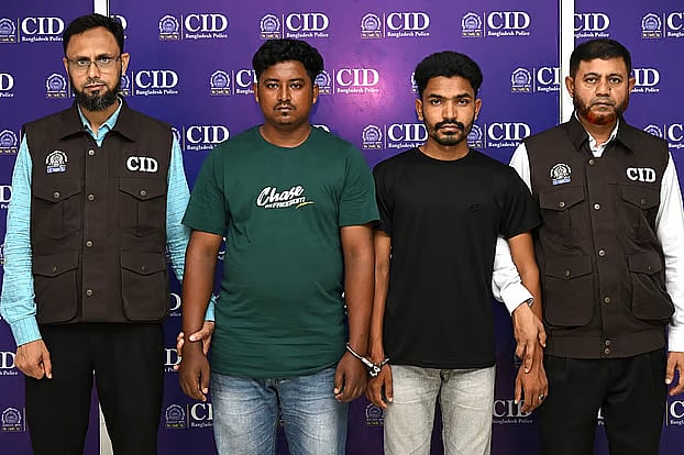 Arrested by CID, Md Rakibul Hossain and Md Roni Islam (wearing black T-shirt).