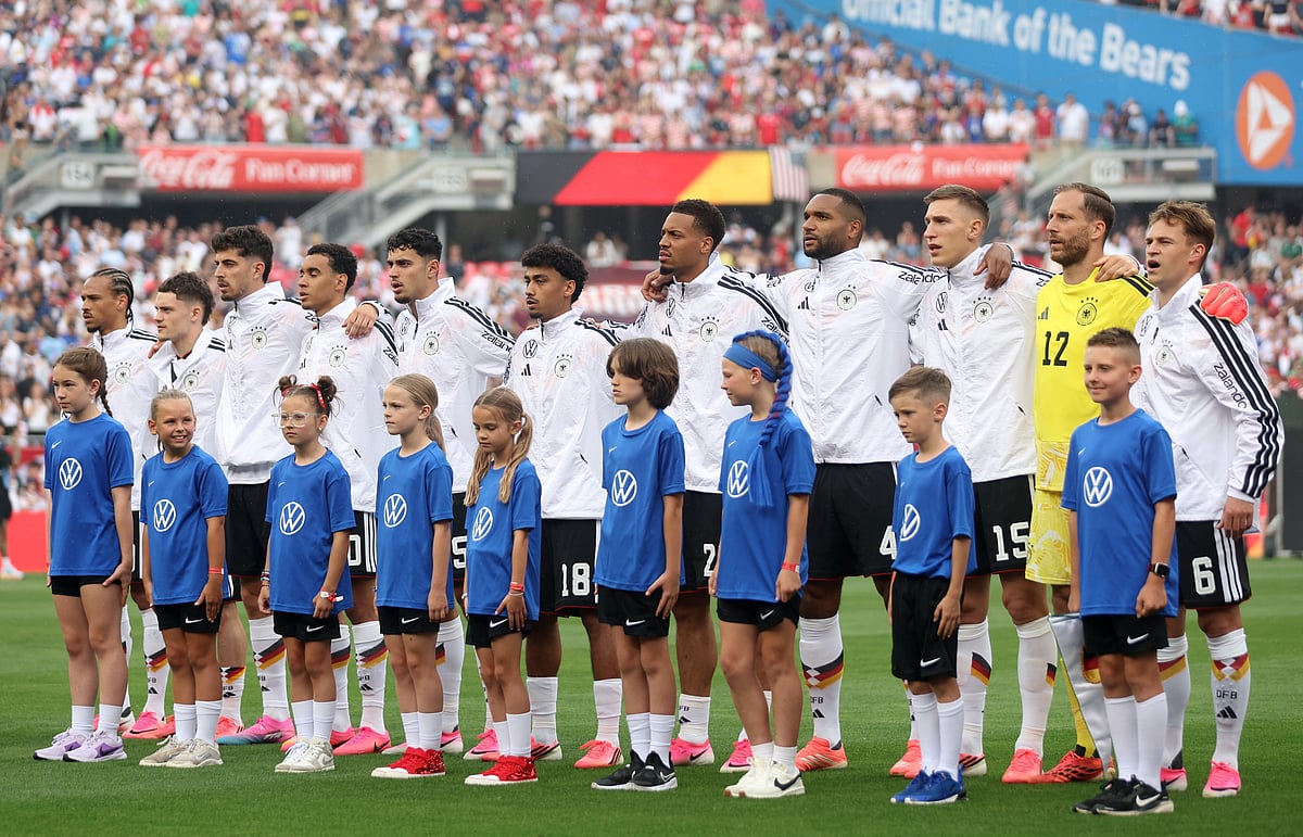 Germany players line up during the national anthems
