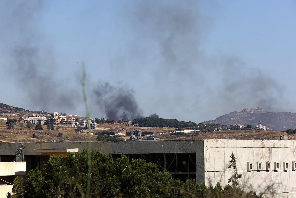 This photograph taken from the southern Lebanese city of Nabatieh shows smoke rising from the site of Israeli artillery shelling that targeted the forest area of Ali Al-Taher near Nabatieh on 18 June, 2026. The Israeli military said on June 18 it will continue operating in southern Lebanon and "remove threats" beyond its so-called security zone, after the US and Iran signed an agreement to end the Middle East war, including in Lebanon.